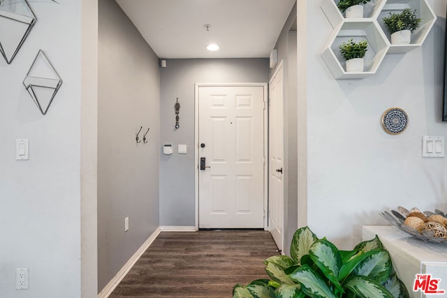 interior space with dark wood-type flooring