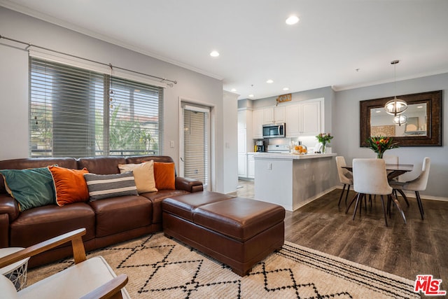 living room featuring crown molding and light wood-type flooring