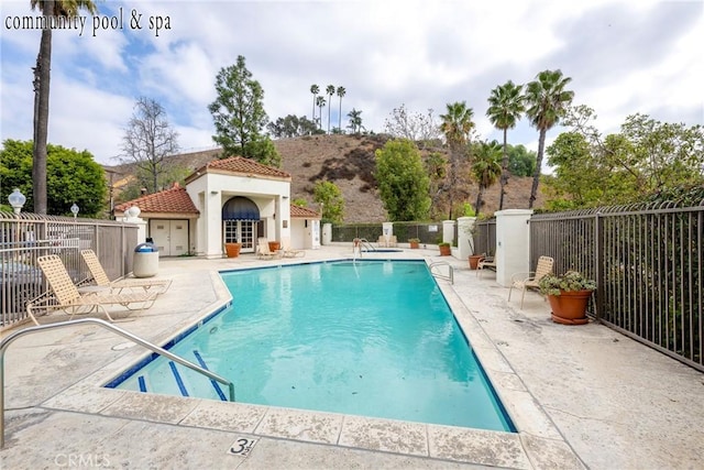 view of pool featuring a patio area