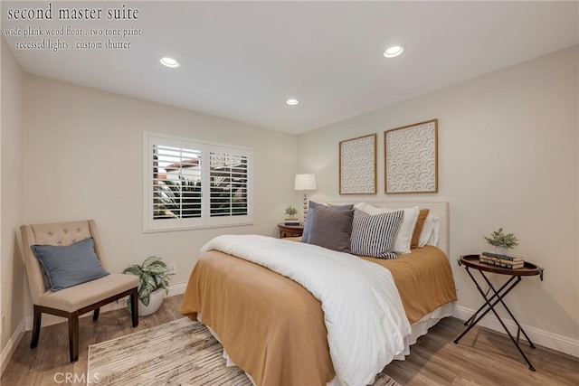 bedroom featuring light hardwood / wood-style floors