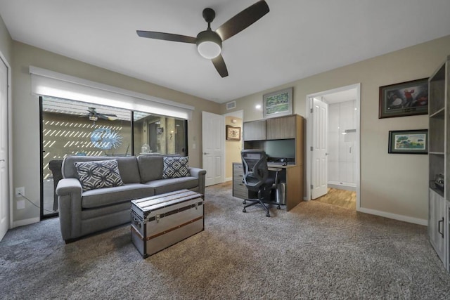 interior space with ceiling fan