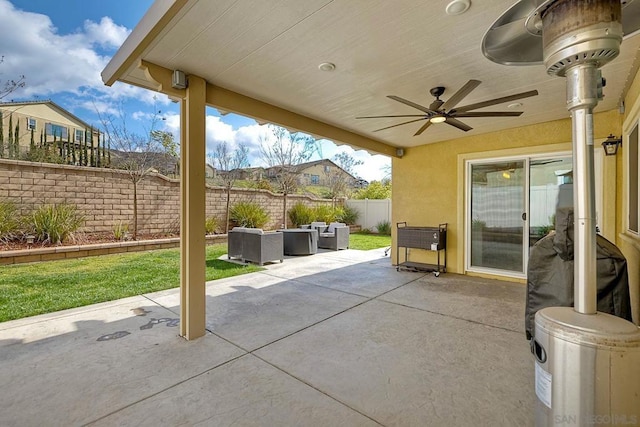 view of patio with ceiling fan and an outdoor hangout area