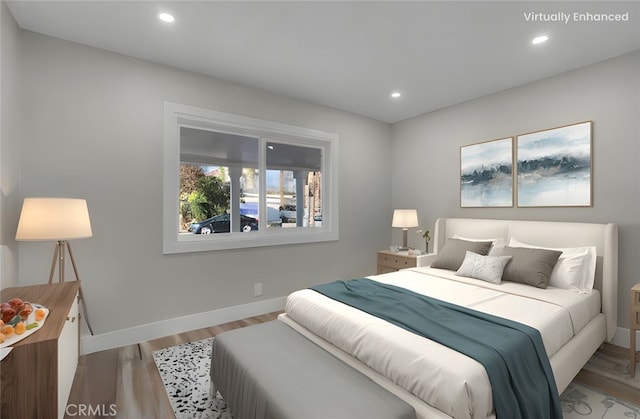 bedroom featuring light wood-type flooring