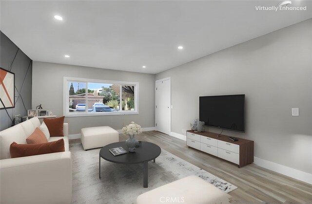 living room with light hardwood / wood-style floors