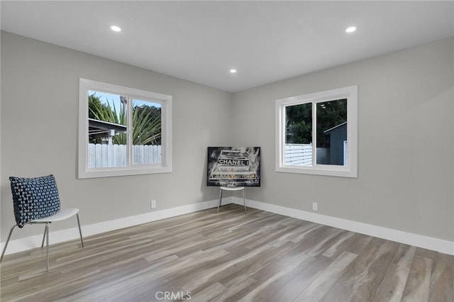 unfurnished room featuring light hardwood / wood-style flooring