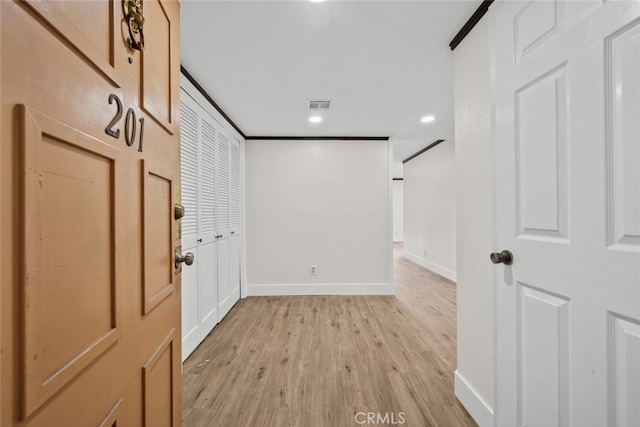 hallway featuring light hardwood / wood-style flooring