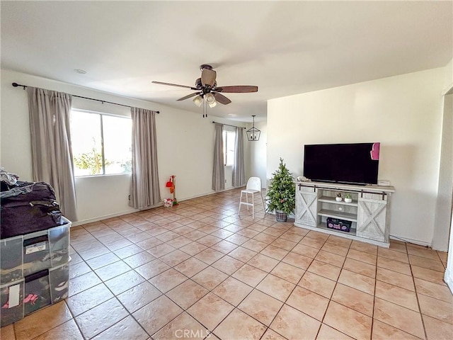 living room with light tile patterned flooring and ceiling fan