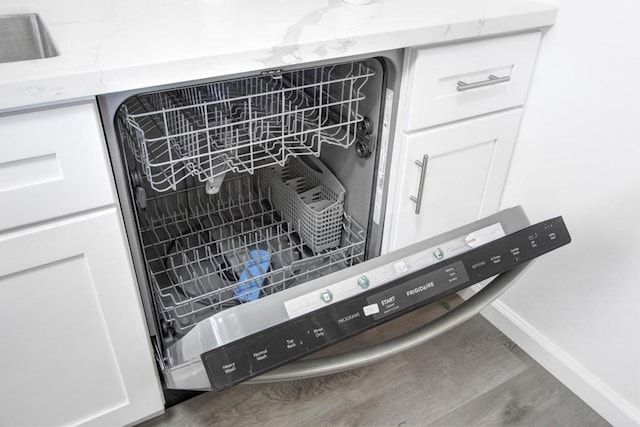 interior details featuring white cabinetry