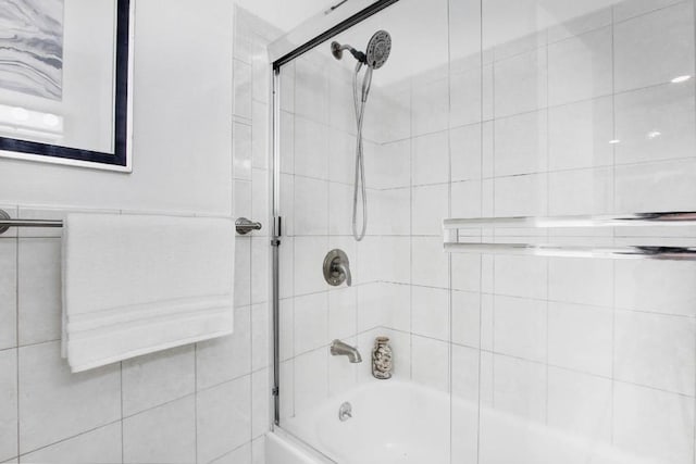 bathroom featuring enclosed tub / shower combo