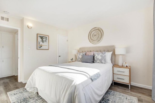 bedroom with light wood-type flooring