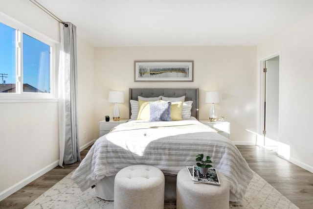 bedroom with wood-type flooring