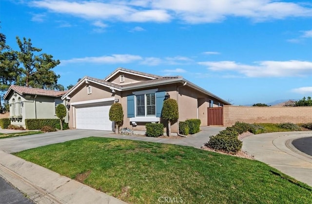 view of front facade with a front yard and a garage