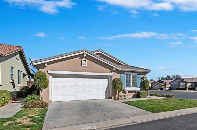 single story home featuring a garage, driveway, and stucco siding