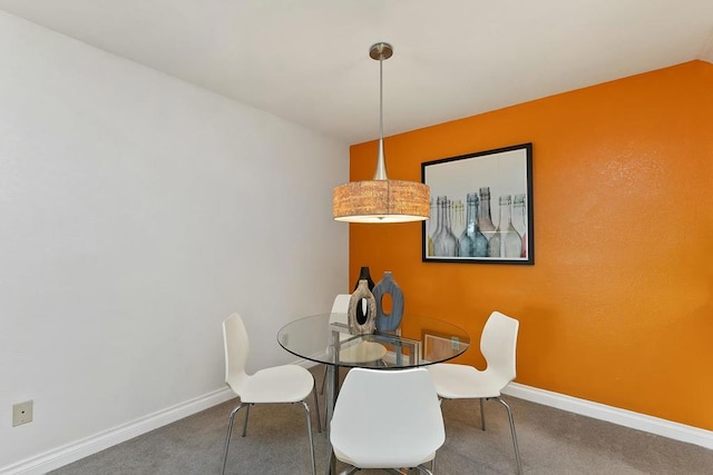 view of carpeted dining area