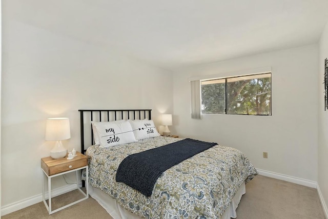 bedroom with light carpet