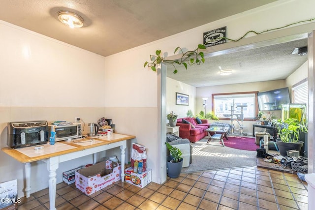 office featuring tile patterned floors and a textured ceiling