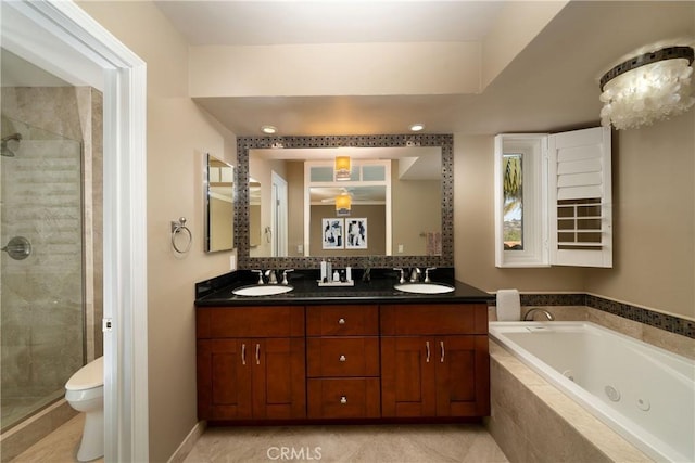 full bathroom featuring toilet, tile patterned floors, vanity, and shower with separate bathtub