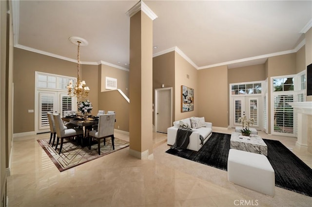 12999 Caminito Pointe Del Mar, Del Mar, CA 92014 - dining area with a chandelier, french doors, crown molding, healthy amount of natural light, and a high ceiling