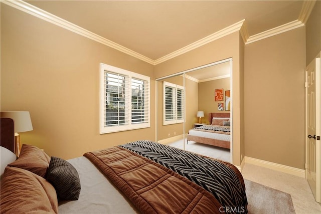 bedroom with ornamental molding, light carpet, and a closet