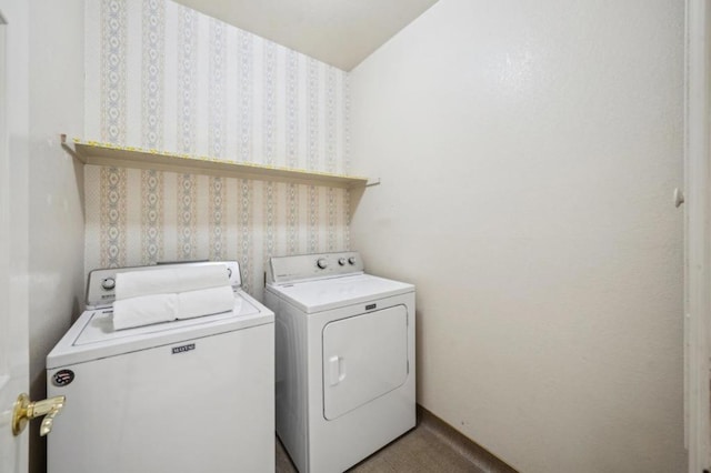 laundry area featuring washing machine and dryer