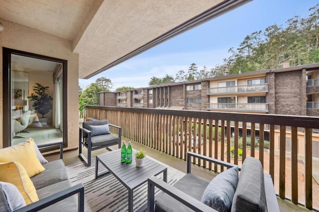 balcony with an outdoor hangout area