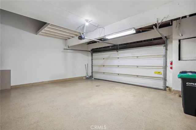 garage featuring a garage door opener