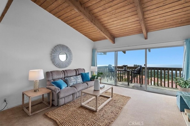 carpeted living room featuring lofted ceiling with beams and wood ceiling