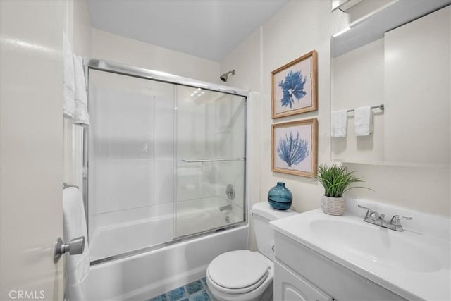 full bathroom with vanity, combined bath / shower with glass door, and toilet