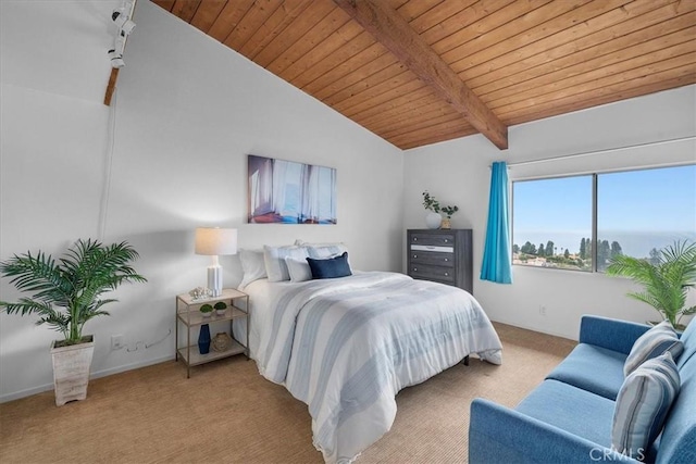 bedroom with lofted ceiling with beams, light colored carpet, and wooden ceiling