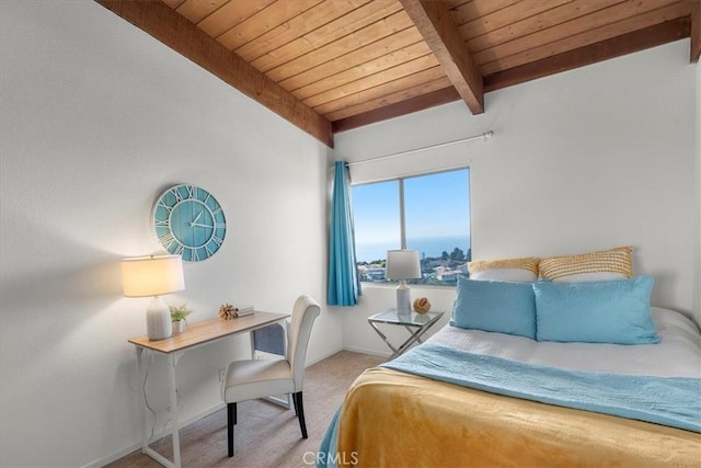 carpeted bedroom with wood ceiling and beam ceiling