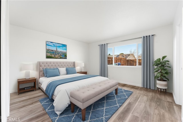 bedroom featuring hardwood / wood-style flooring