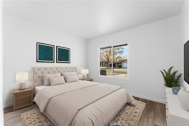 bedroom featuring hardwood / wood-style floors