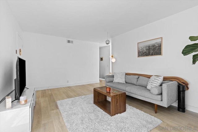 living room with light wood-type flooring