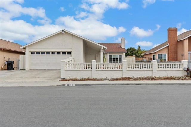 ranch-style home featuring a garage