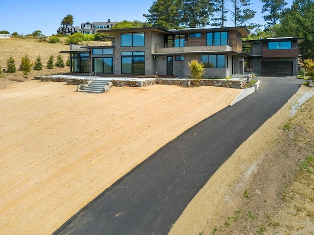 contemporary home featuring a garage