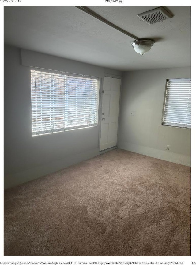 empty room with carpet floors