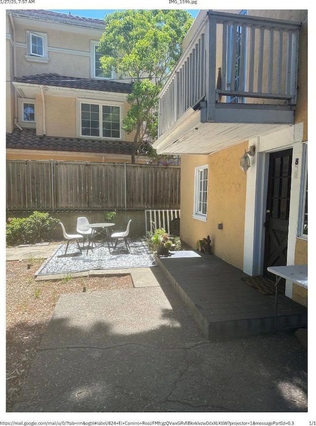 view of patio / terrace with a balcony