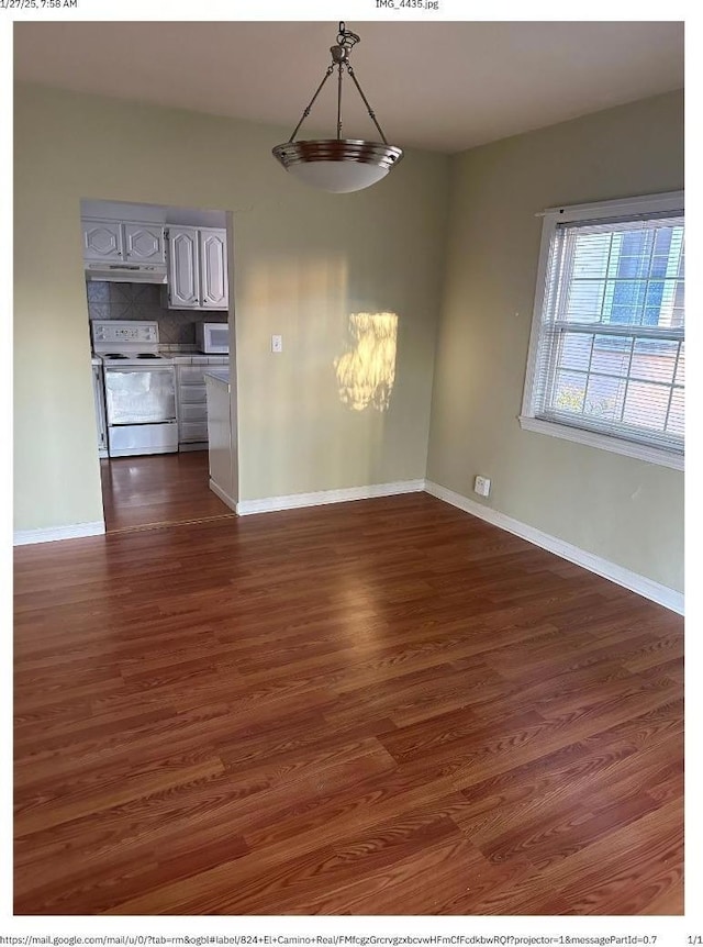 interior space with dark hardwood / wood-style floors