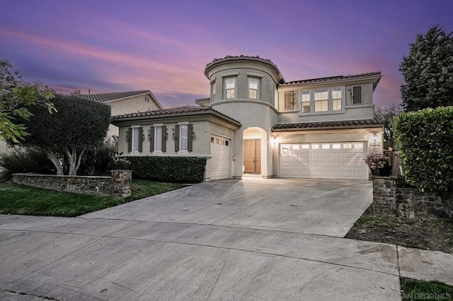 view of front of home with a garage