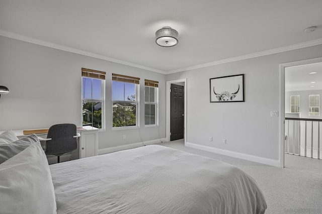 bedroom with multiple windows, ornamental molding, and light colored carpet