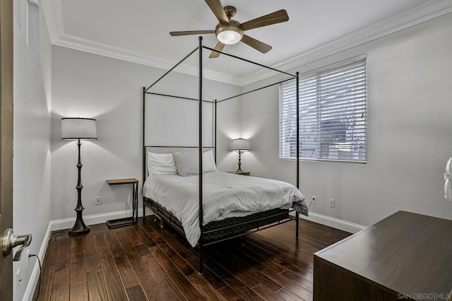 bedroom featuring crown molding, dark wood-type flooring, and ceiling fan