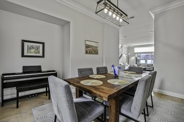 dining space with ornamental molding