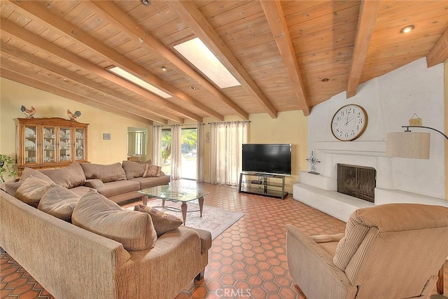 living room featuring wood ceiling, a large fireplace, and lofted ceiling with skylight