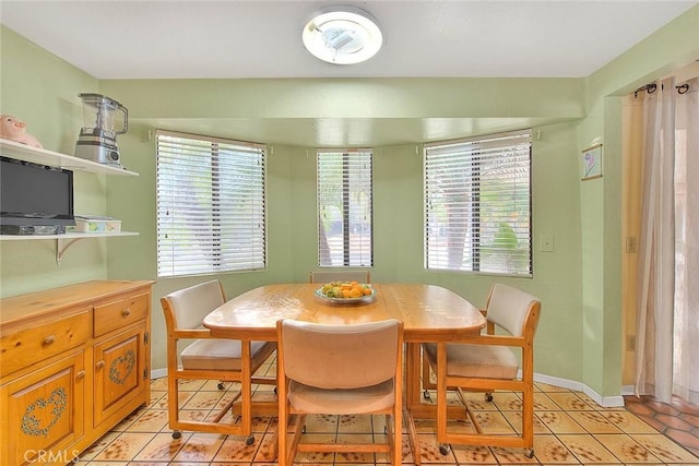 dining room with light tile patterned floors