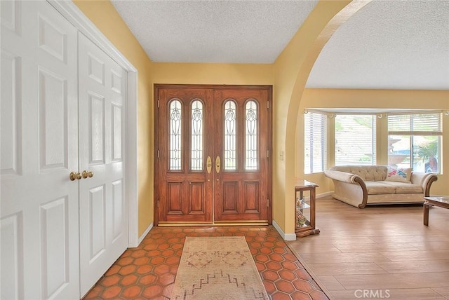 entrance foyer featuring a textured ceiling