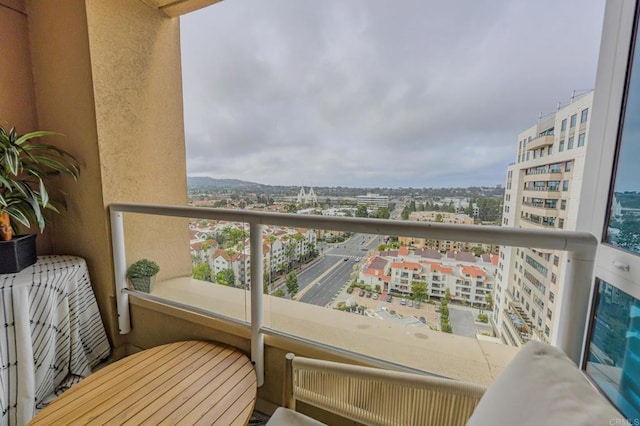 balcony with radiator and a city view