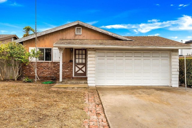 ranch-style house featuring a garage