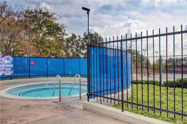 view of pool featuring a community hot tub