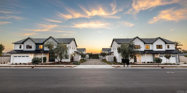 modern farmhouse featuring a garage