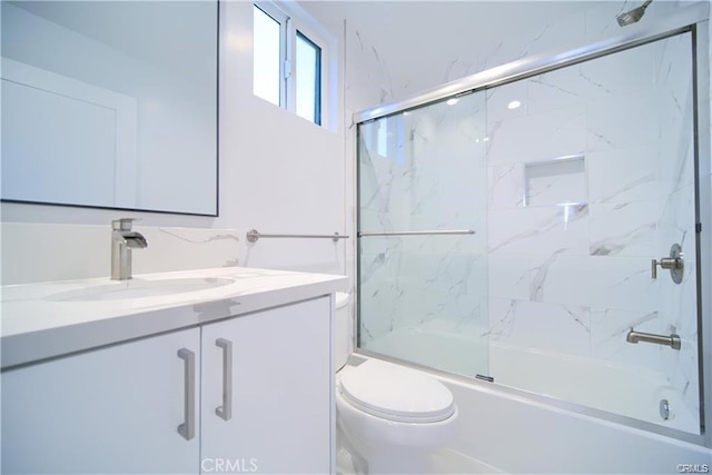 4455 S Slauson Ave, Culver City, CA 90230 - full bathroom featuring toilet, vanity, and combined bath / shower with glass door
